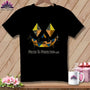 Black t-shirt with a patchwork jack-o-lantern face and 