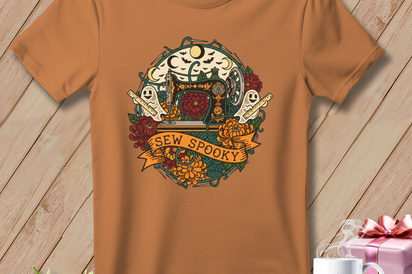 Brown t-shirt with a Halloween sewing design and "SEW SPOOKY" text.