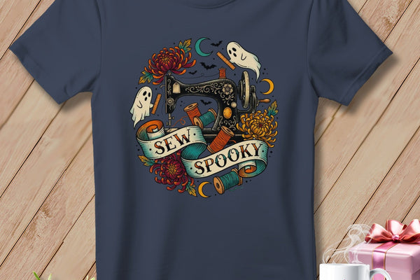 Dark blue t-shirt with "Sew Spooky" text, sewing machine, ghosts, and flowers graphic.