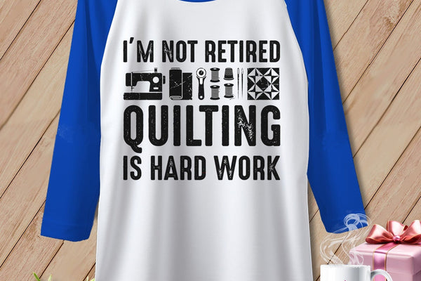 MyDesigns Physical Item XS / White/True Royal I’m Not Retired ~ Quilting is Hard Work ~ Raglan Tee