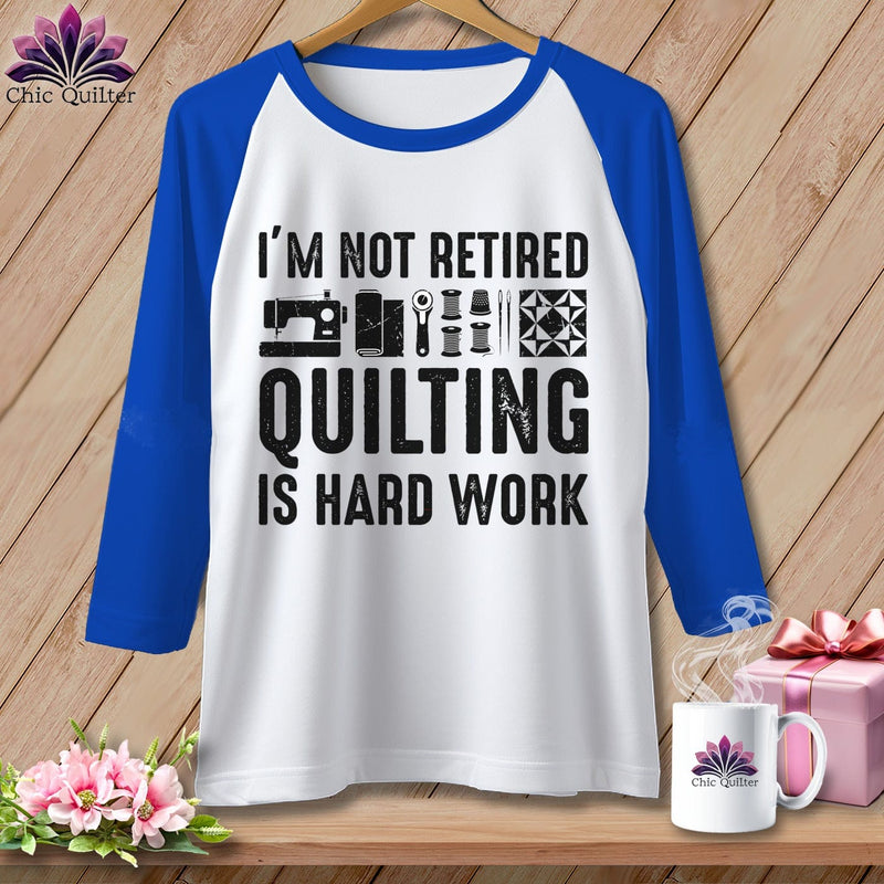 MyDesigns Physical Item XS / White/True Royal I’m Not Retired ~ Quilting is Hard Work ~ Raglan Tee