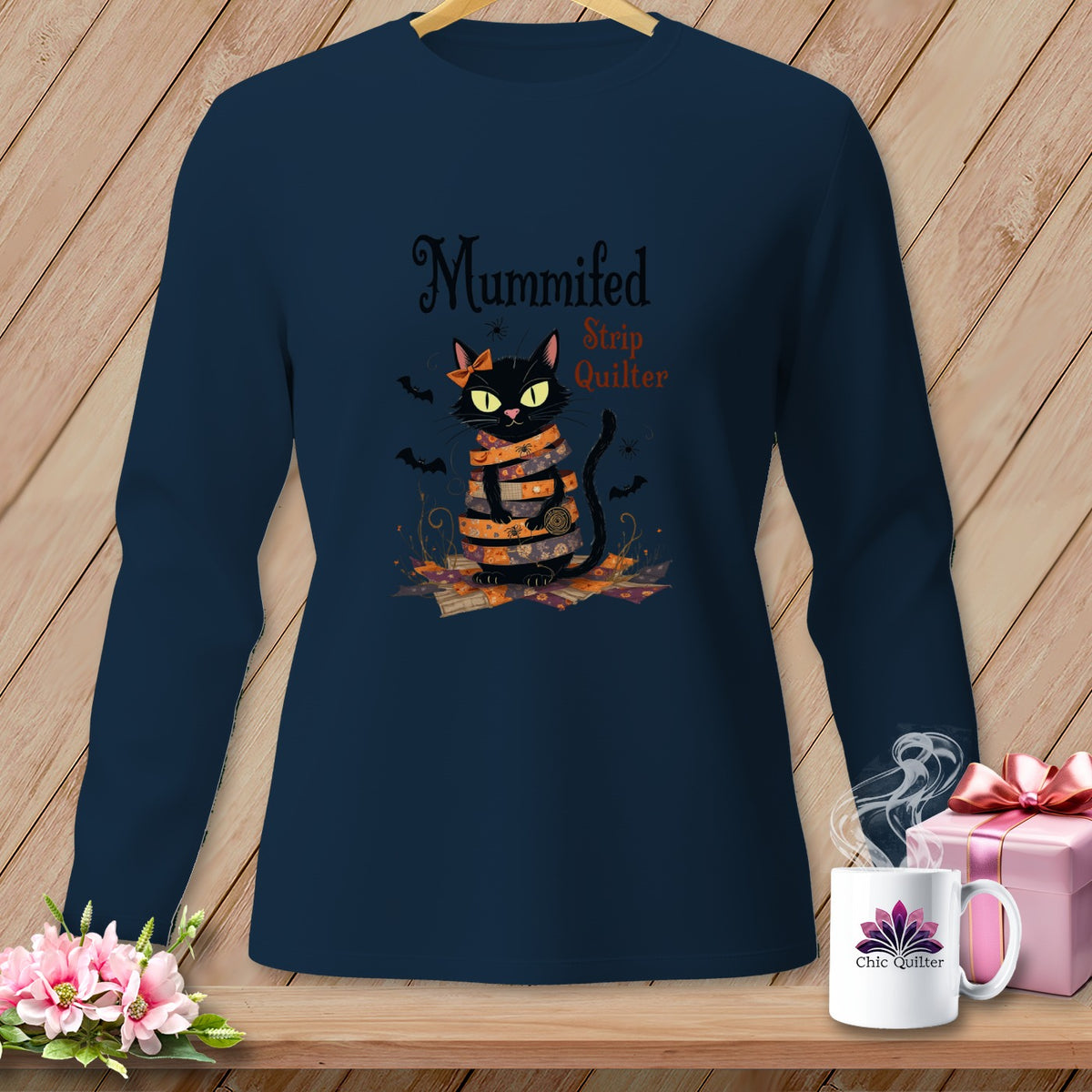 Navy long-sleeve shirt with a Halloween black cat graphic and text "Mummified Strip Quilter".