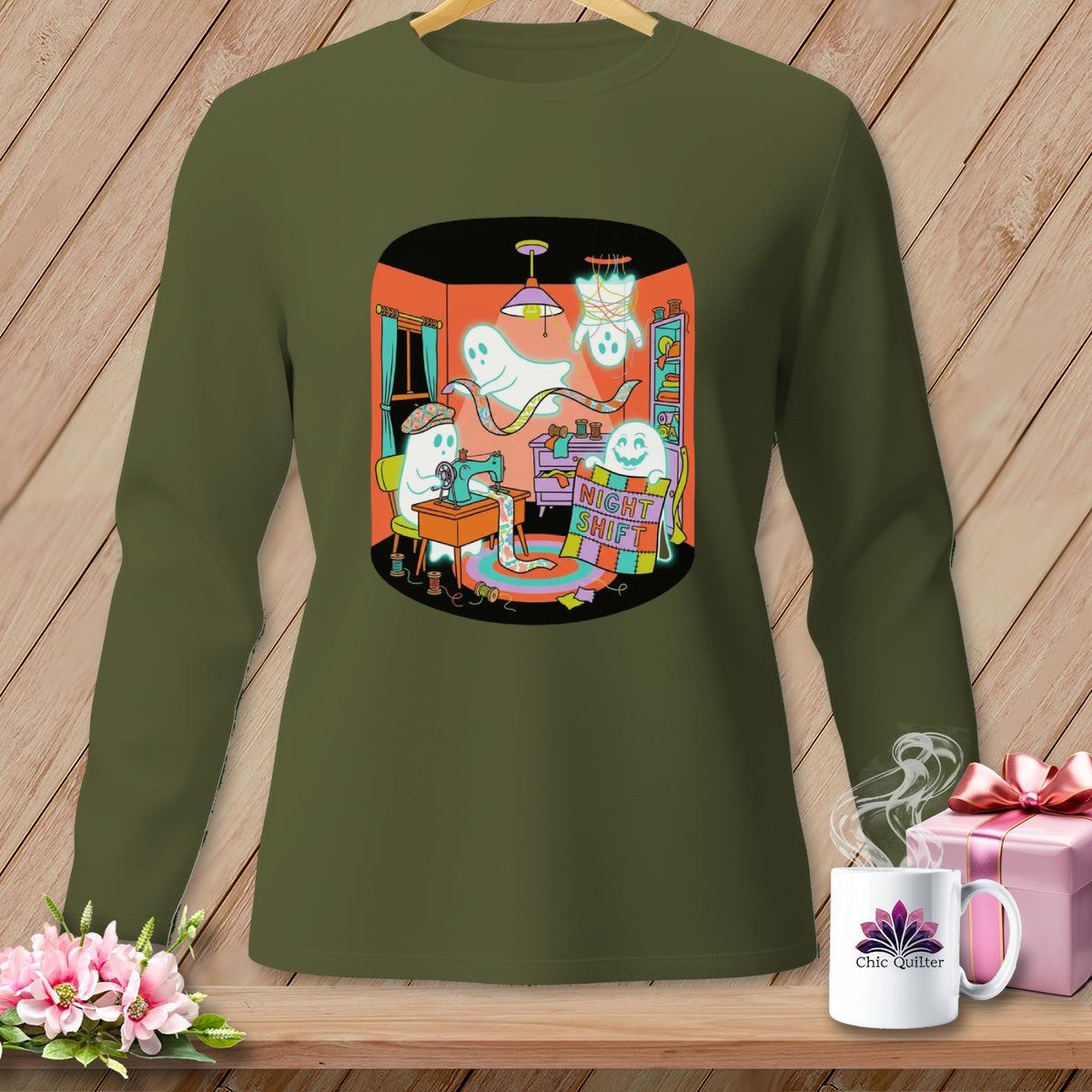Ghosts sewing at night, one is hanging, with "NIGHT SHIFT" text.