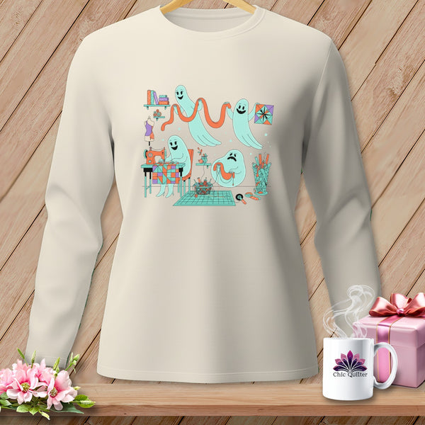 Ghosts sewing and quilting on a cream long-sleeve shirt.