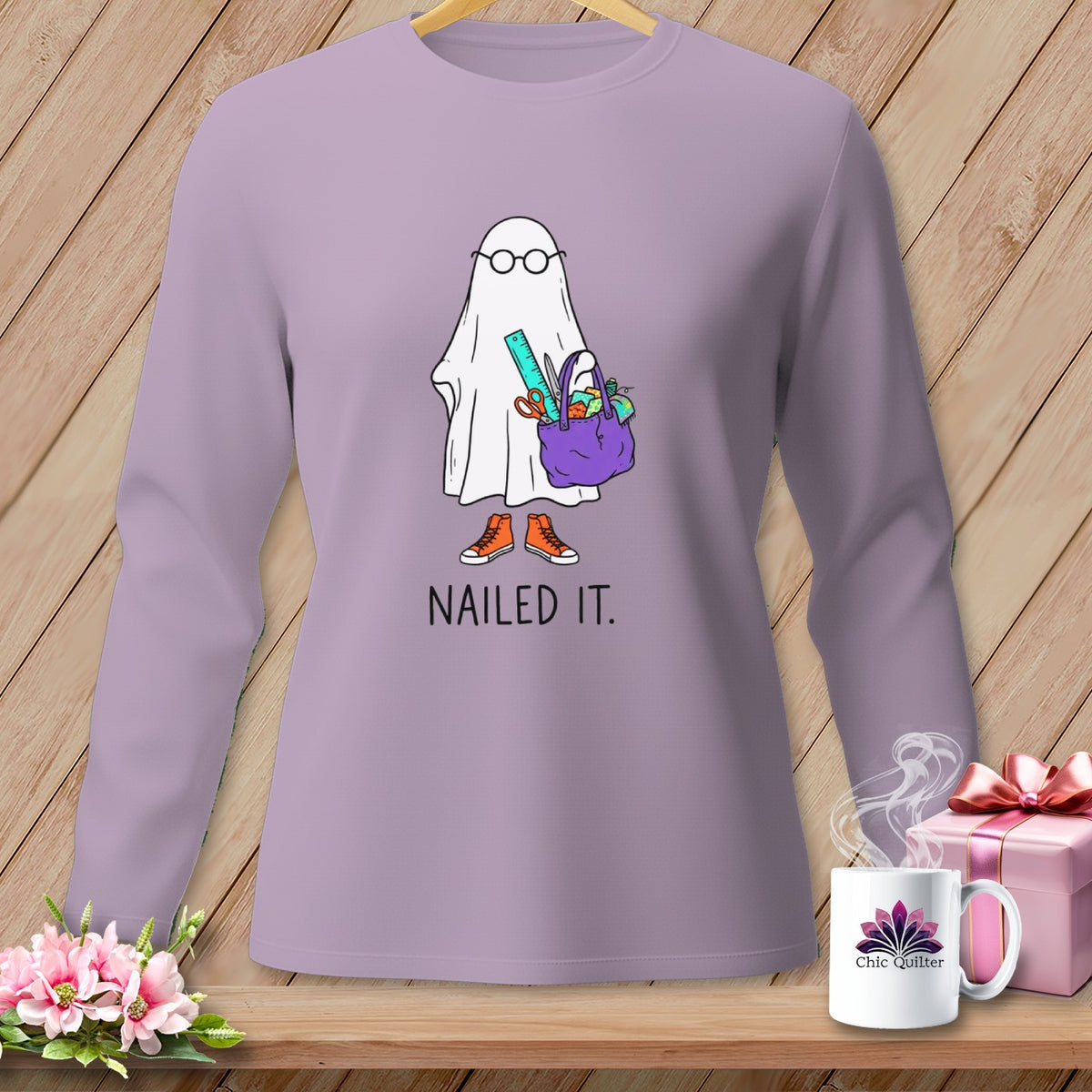 Ghost wearing glasses and sneakers carrying a craft bag, text "NAILED IT."