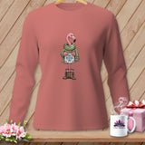 Pink flamingo wearing a scarf and boots holding a snowflake gift box.