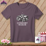Purple t-shirt with graphic of folded quilt and text 