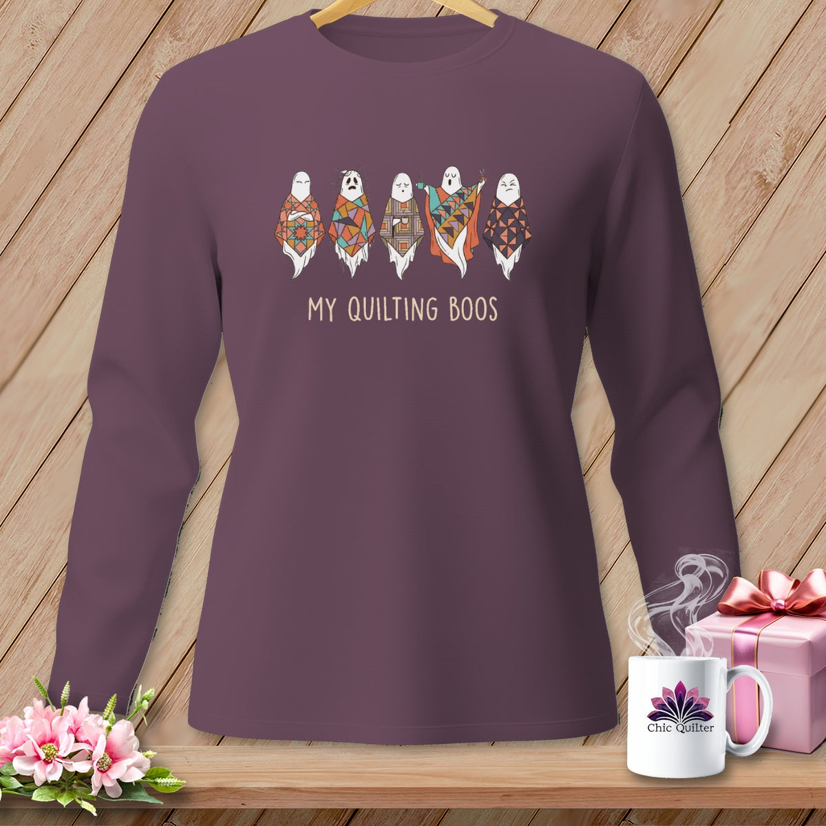 Long sleeve shirt with five quilting ghost illustrations and text "MY QUILTING BOOS".