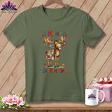 An olive green t-shirt featuring a cartoon moose graphic draped in a quilt with the text I Moose-t Buy More Fabric.