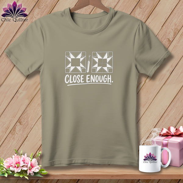T-shirt with quilting block graphic and the text "CLOSE ENOUGH."