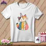 A white t-shirt features a colorful patchwork cat graphic wearing a thimble hat.