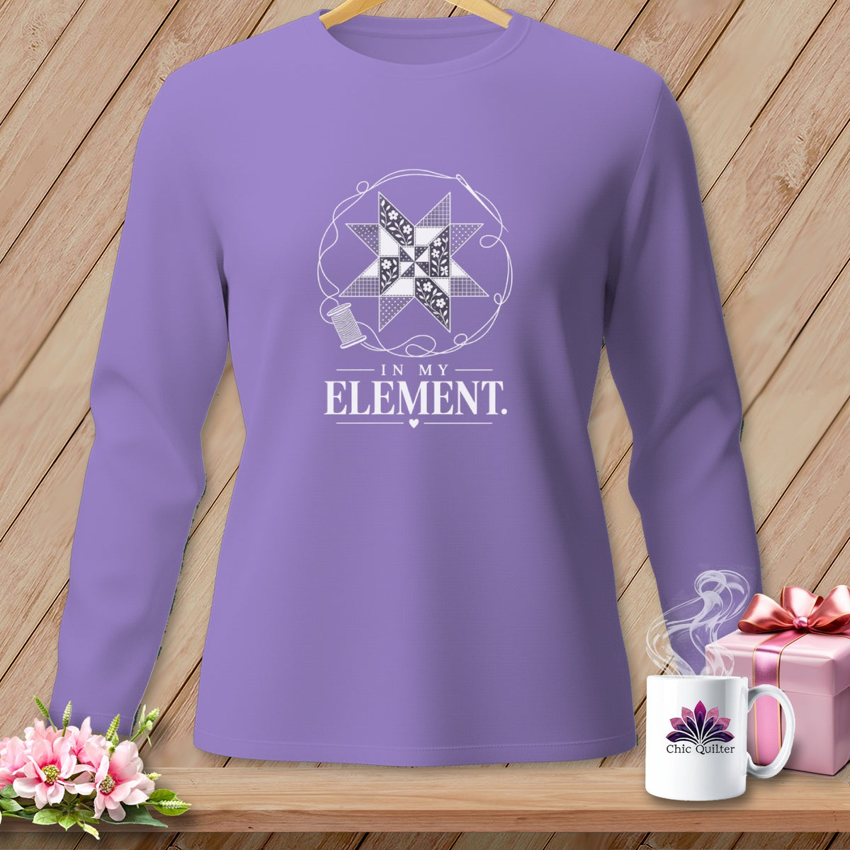 Long-sleeve purple shirt with quilting graphic and "IN MY ELEMENT" text.