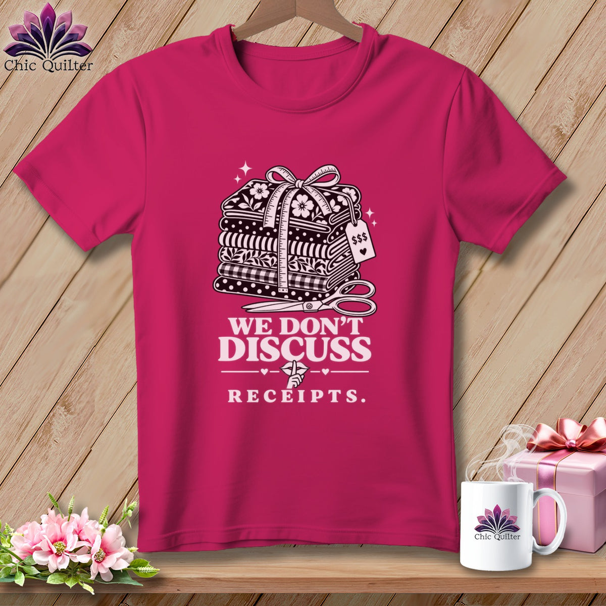 Fuchsia t-shirt with sewing illustration and text "WE DON'T DISCUSS RECEIPTS."