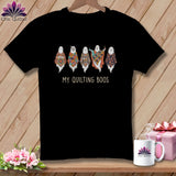 Black t-shirt with five patchwork ghosts and the text 