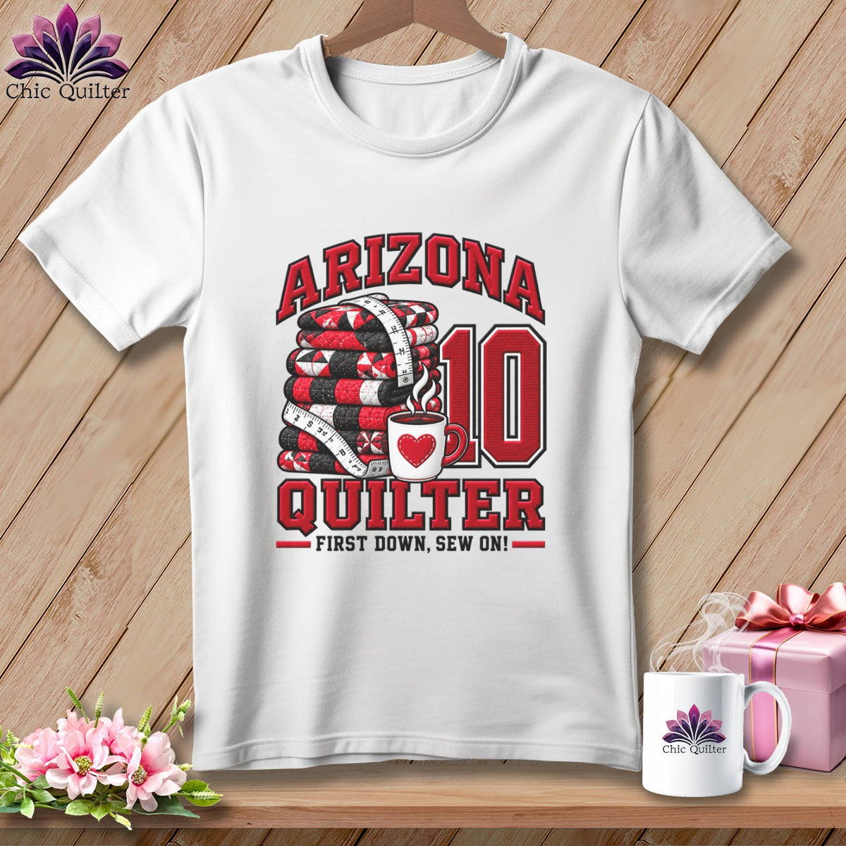 A white t-shirt features graphic text reading Arizona Quilter, a stack of quilts, and a coffee mug.