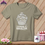 T-shirt with basket overflowing with folded fabric and text 
