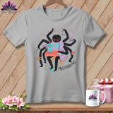Gray t-shirt with cartoon spider at sewing machine, holding coffee, and text 