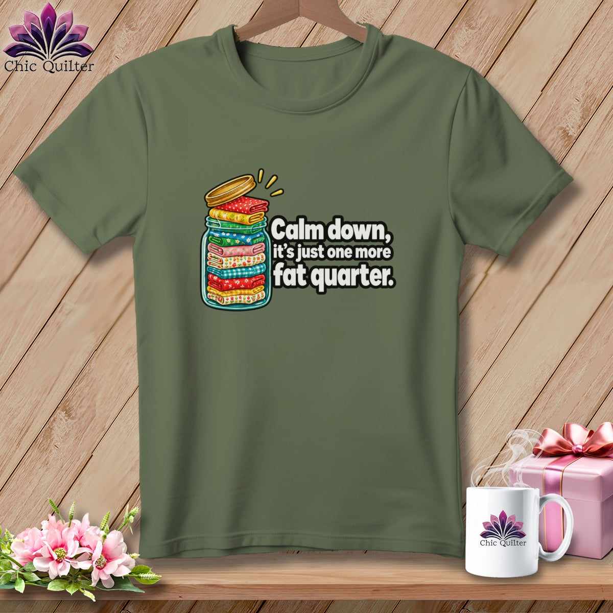 Olive green t-shirt featuring a graphic of folded fabric in a jar with text.