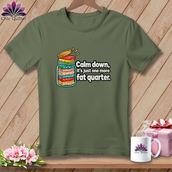 Olive green t-shirt featuring a graphic of folded fabric in a jar with text.
