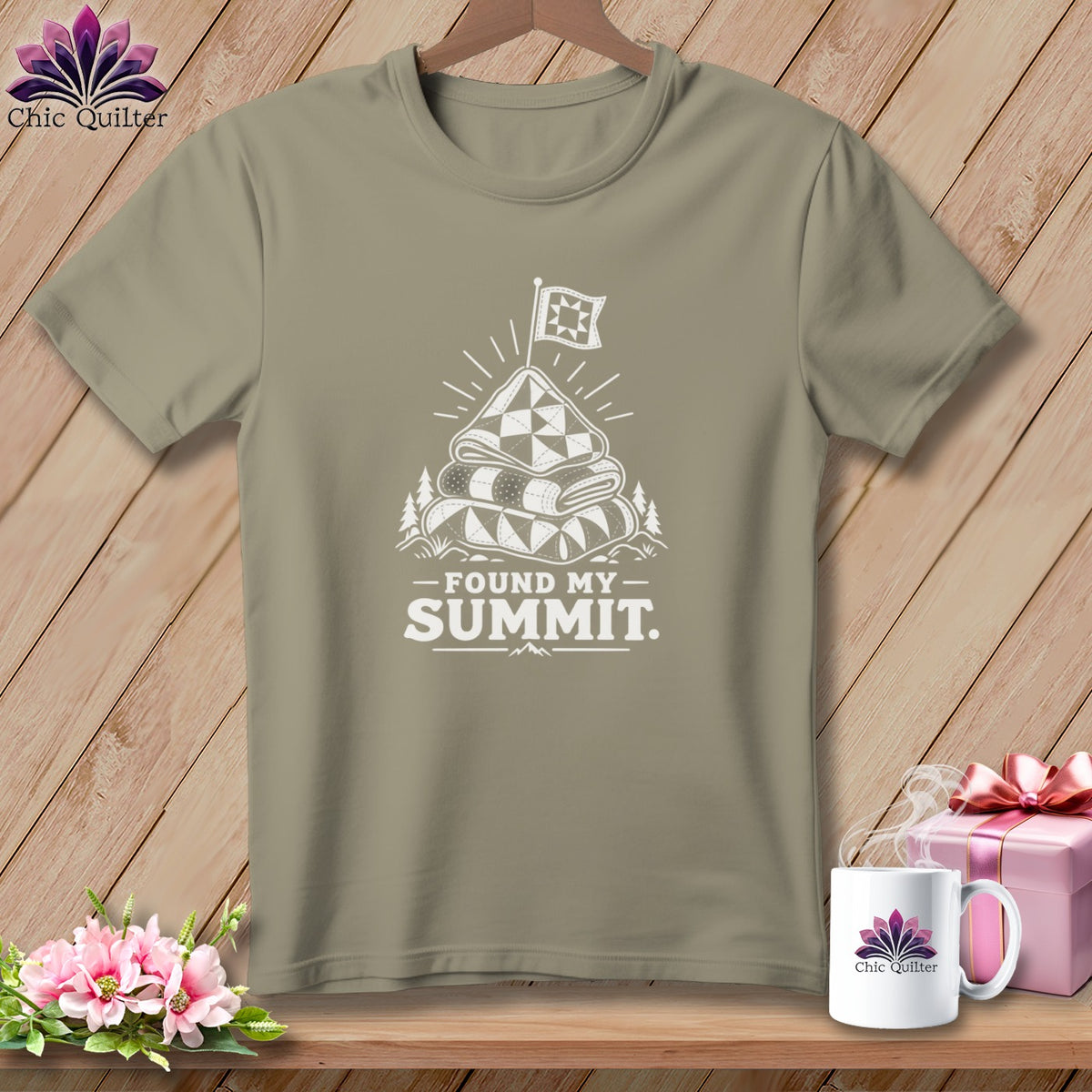 Taupe t-shirt with white graphic: "Found My Summit" text and a quilt on a mountain peak.