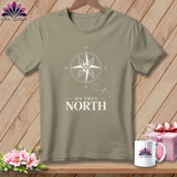 Tan t-shirt with white compass graphic and text 