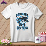 White crewneck t-shirt featuring a blue panther graphic, spool of thread, and Carolina Sew Crew text.