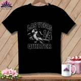 A black t-shirt featuring a parrot with an eye patch holding a spool of thread, surrounded by the text Las Vegas Quilter.