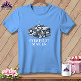 Light blue t-shirt with a folded quilt and 