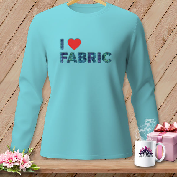 Teal long-sleeve shirt with "I ❤️ FABRIC" text in mosaic pattern.