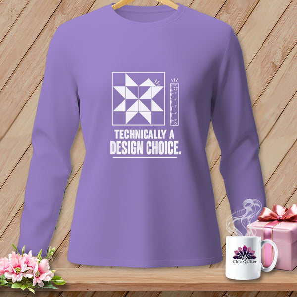 Purple long-sleeve shirt with a quilt block graphic and "Technically a Design Choice." text.