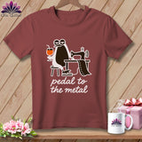Maroon t-shirt with a penguin sewing and the text 