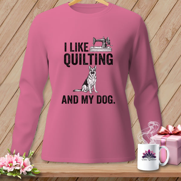 Pink long sleeve shirt with "I like quilting and my dog" graphic.