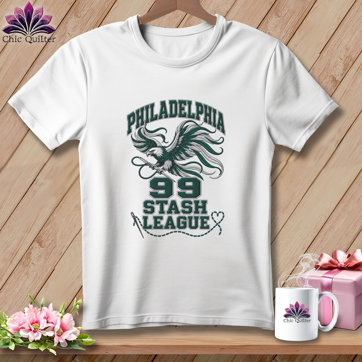 White t-shirt featuring a green eagle graphic and text that reads Philadelphia 99 Stash League.