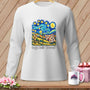White long-sleeve shirt with a "Gogh Quilt Yourself" graphic depicting a quilt hanging outdoors under a starry sky.