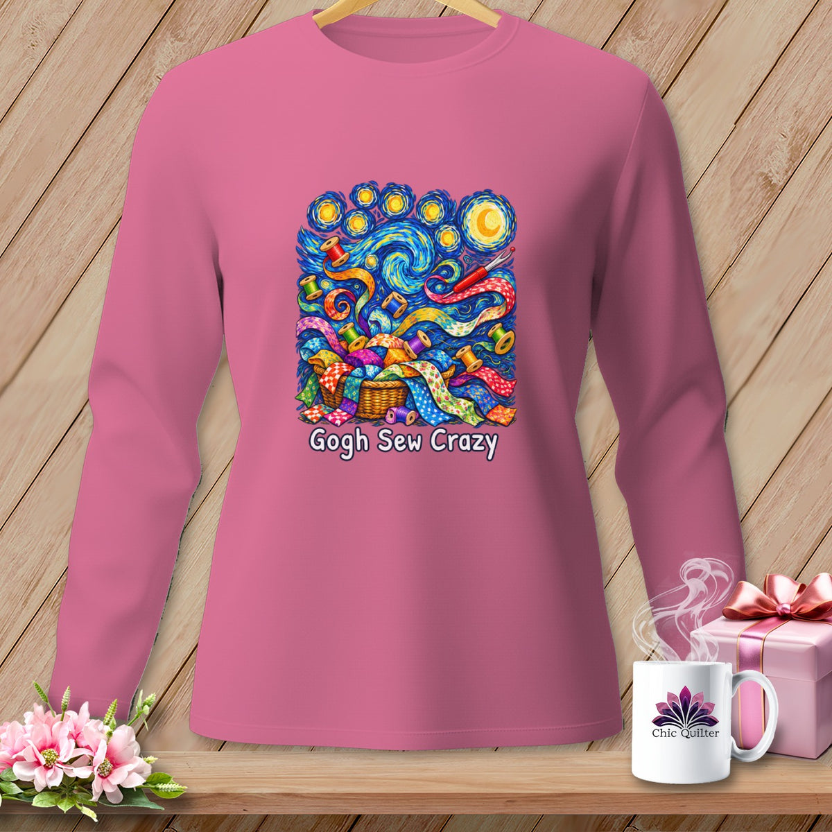 Pink long-sleeve shirt with a "Gogh Sew Crazy" starry night sewing basket graphic.