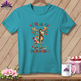 Turquoise t-shirt featuring a cartoon moose wrapped in a quilt, decorated antlers, and text reading I Moose-t Buy More Fabric.