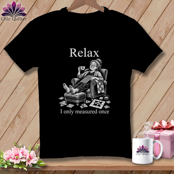 Black t-shirt with "Relax, I only measured once" and a woman sewing.