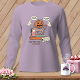 Halloween pumpkin using a sewing machine with ghosts and text 