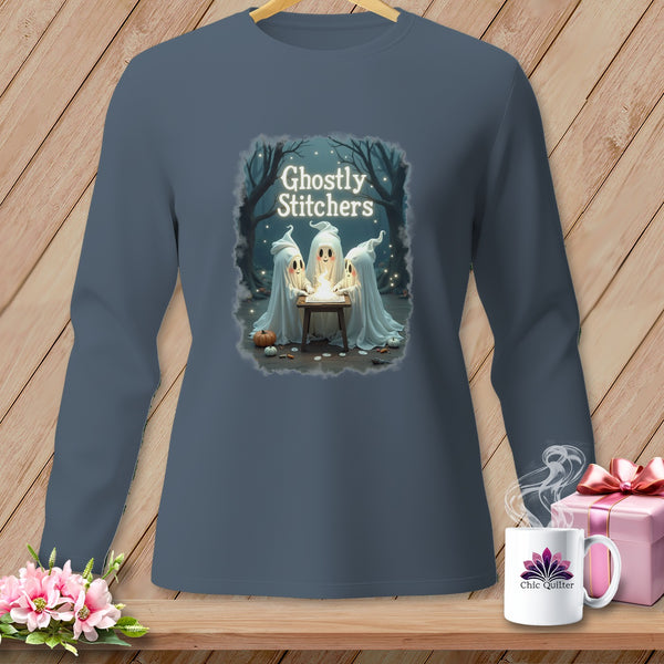 Three cute ghosts gather around a table with a candle, the text "Ghostly Stitchers" above.