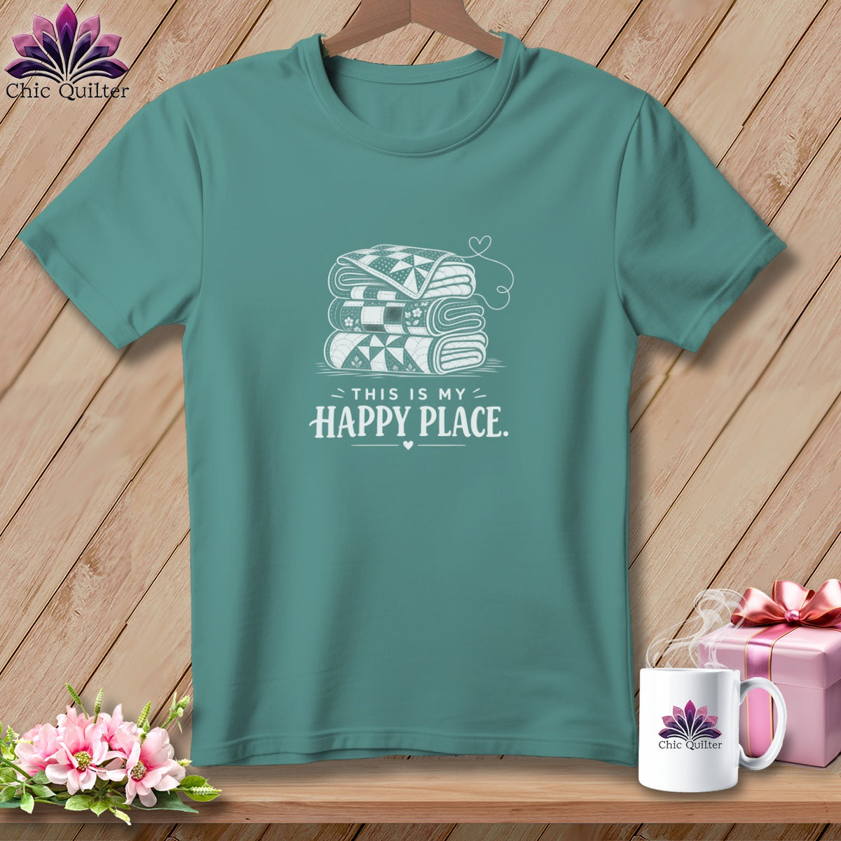 Teal t-shirt with stacked quilts and "This is my happy place" text graphic.