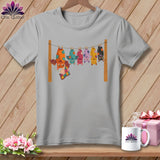 Grey t-shirt with colorful bats hanging on a clothesline.