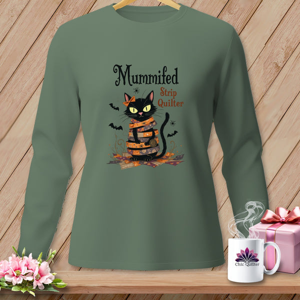 Mummified Strip Quilter graphic on a long-sleeve shirt featuring a black cat.