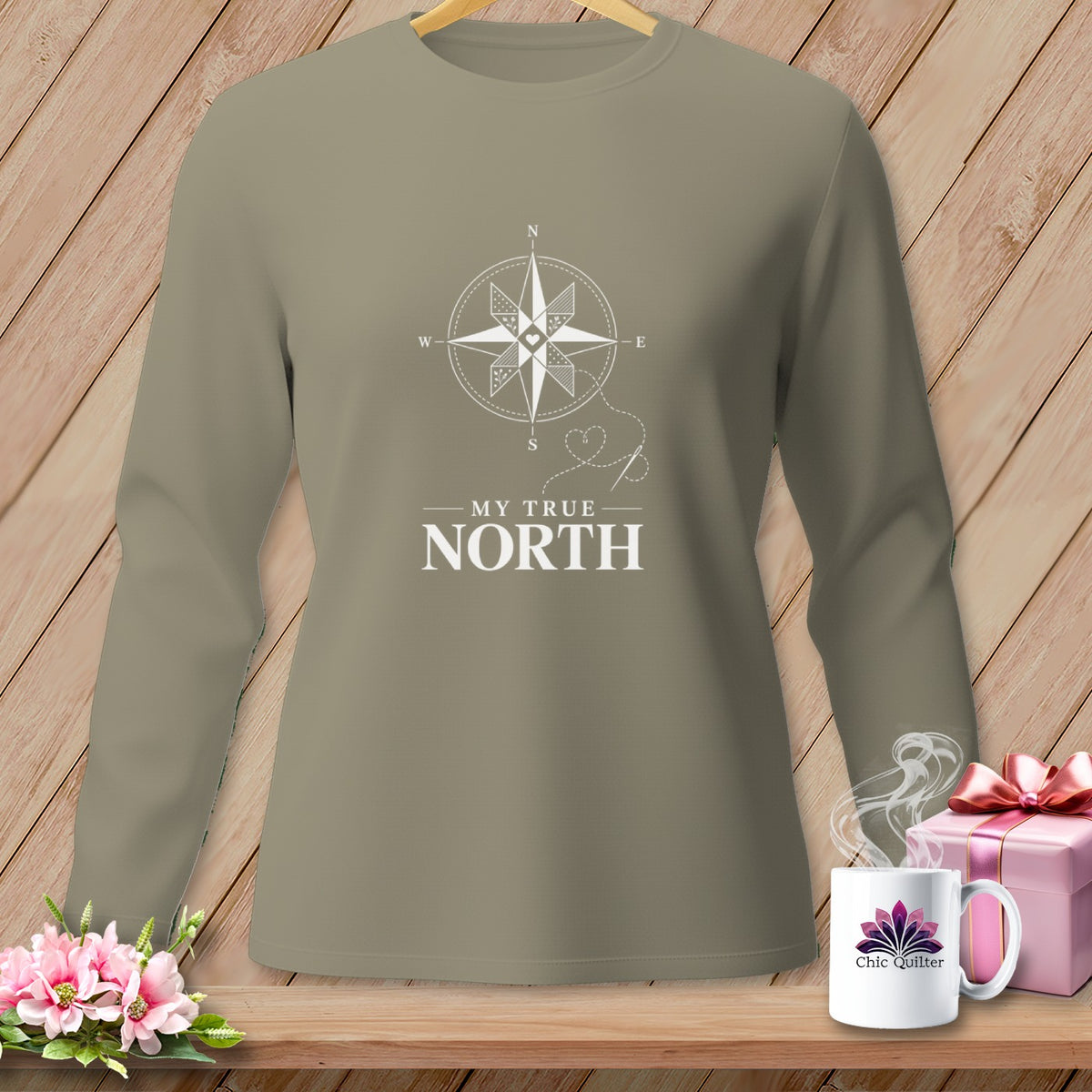 Taupe long-sleeve shirt with "MY TRUE NORTH" and compass design.