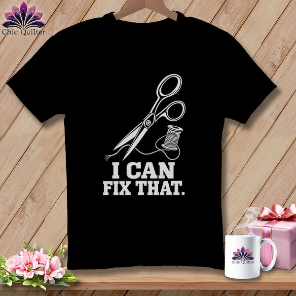 Black t-shirt with white scissors, thread, and text "I CAN FIX THAT."