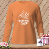 Orange long-sleeve shirt with a rotary cutter and fabric graphic and 