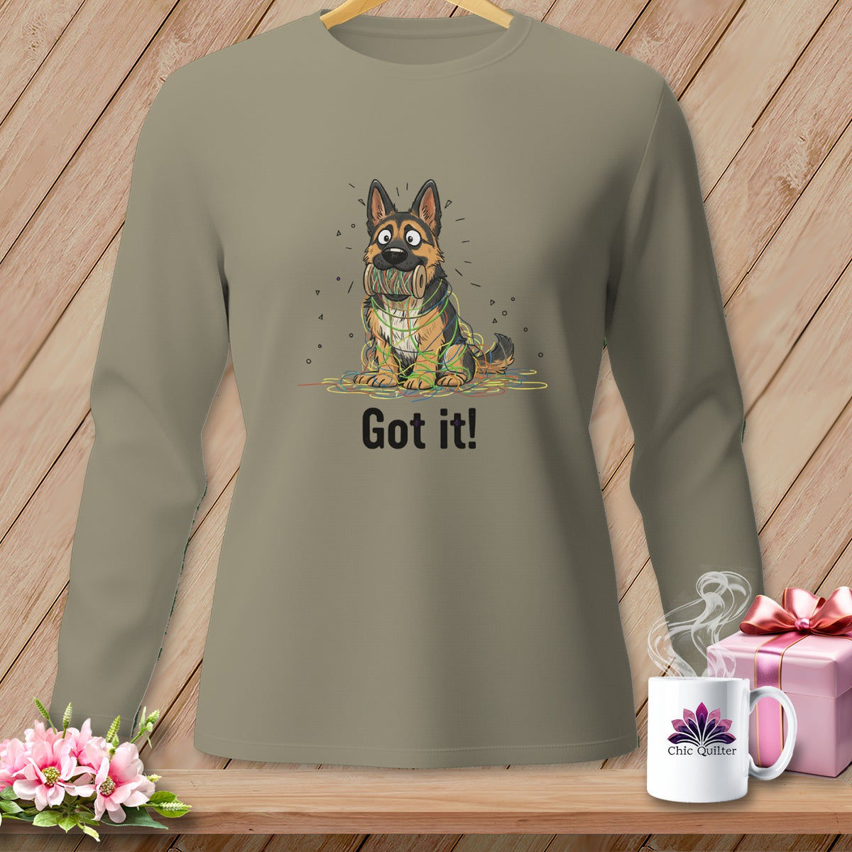 German Shepherd dog caught in colorful yarn with "Got it!" text.