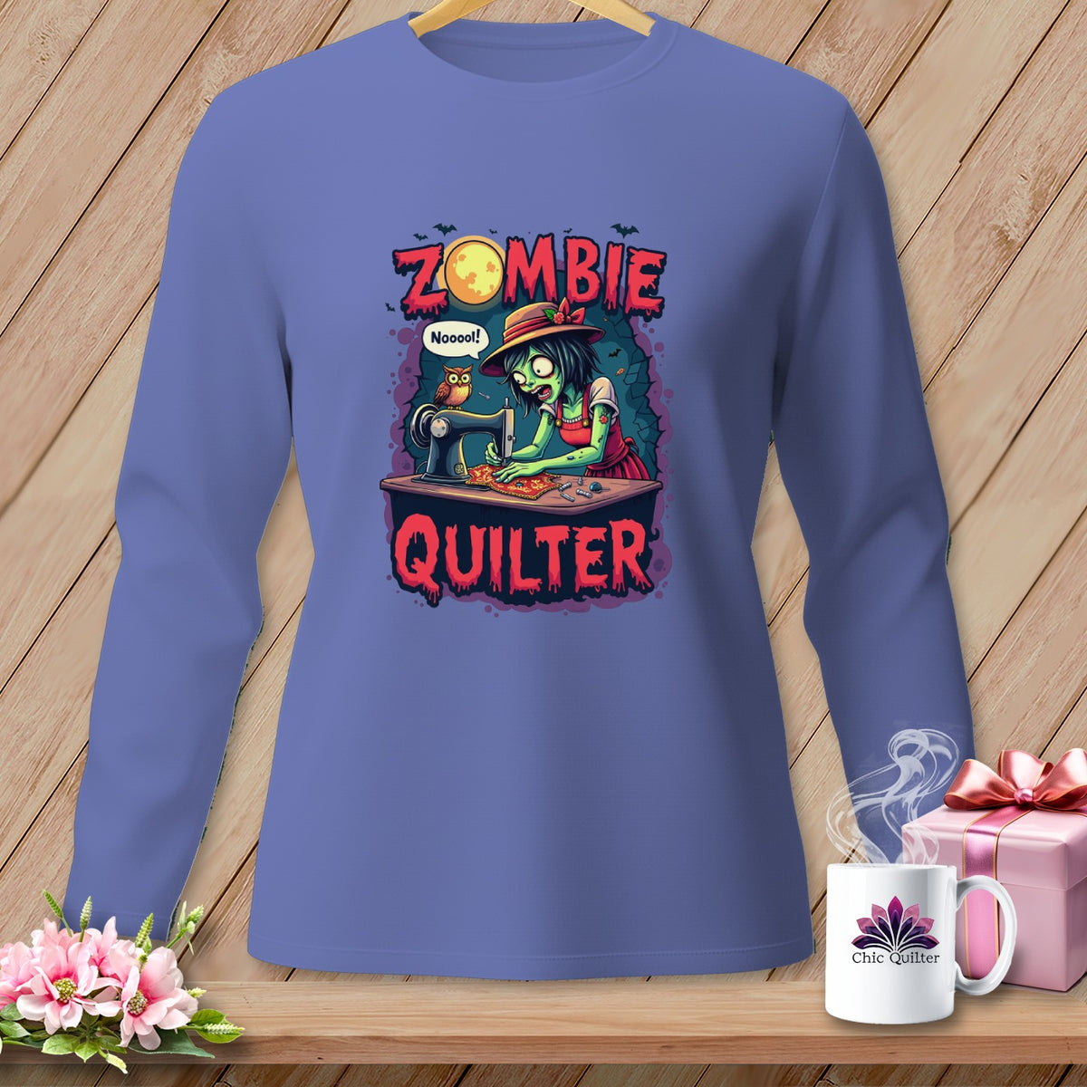 Zombie Quilter graphic on a purple long-sleeve shirt with moon, bats, and owl.
