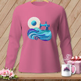 Pink long-sleeved shirt with a blue sewing machine on a wave of fabric.