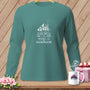 Teal long-sleeve shirt with "Home is Handmade" text and quilt house design.