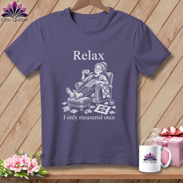 Purple t-shirt with "Relax I only measured once" and quilting motifs.
